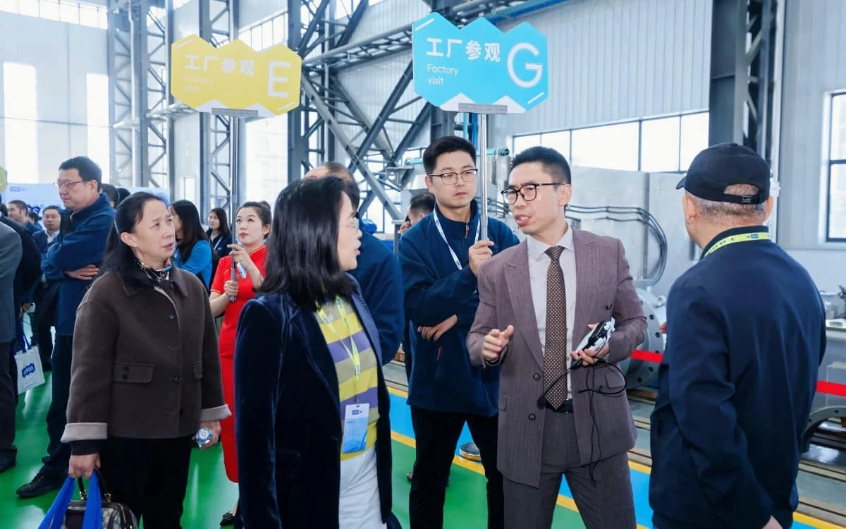 Guests at a stop on the factory tour