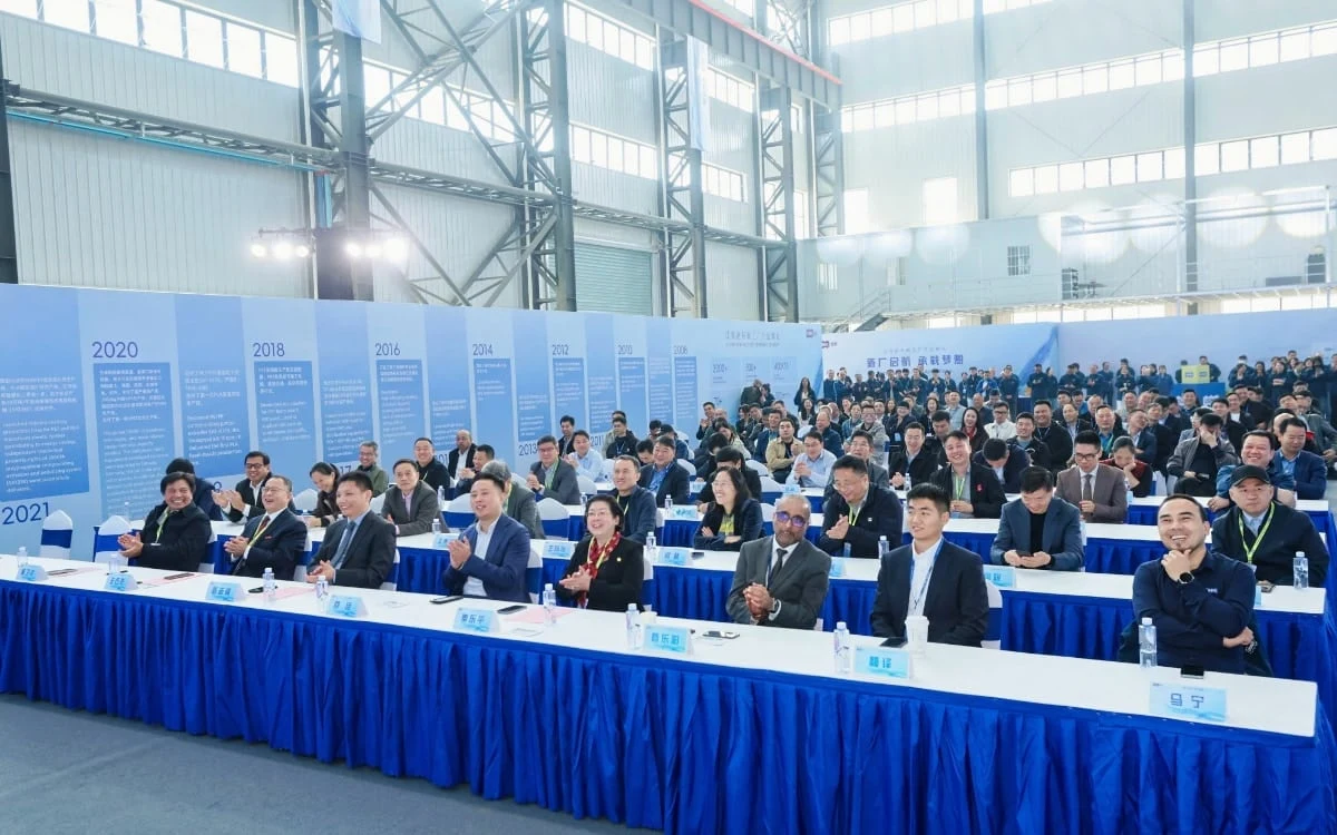 Guests seated at the new factory opening ceremony